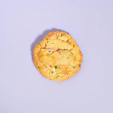 Birthday Cake New York Cookie by Crumbs & Doilies with caramelised white chocolate and rainbow sprinkles.